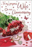 The image captures a romantic anniversary arrangement that might be found on a side table in an Erith home after a surprise delivery. At the centre sits a tight cluster of red roses, their velvety petals luxuriantly full and gently fanned out, showing off rich crimson hues. Each flower appears freshly opened, with the light catching along the petal edges and drawing attention to their layered, almost satin-like texture. The blooms are embraced by fresh green foliage, the leaves smooth and slightly reflective, adding depth and natural contrast to the composition. To one side, an envelope lies ready, its pale surface neat and inviting, suggesting a thoughtfully chosen card with a lovingly written message inside. Nearby rests a subtle piece of jewellery-a fine necklace or pendant-that lies gracefully across the surface, gleaming just enough to hint at its sentimental value. A small, heart-shaped box in deep, romantic red sits close, its form rounded and polished, evoking a hidden gift or treasured keepsake. Scattered around are tiny heart-shaped decorations and glittering accents, like the remnants of celebration, while a lone butterfly motif introduces a feeling of gentle movement and light-hearted charm. The lighting is soft and even, similar to the calm brightness of an afternoon near Erith's riverside, illuminating every detail without harshness. Overall, the scene has been composed with a florist's sense of balance and emotion, bringing together flowers, cards, and keepsakes to visually express enduring affection and the joy of marking another cherished year together.